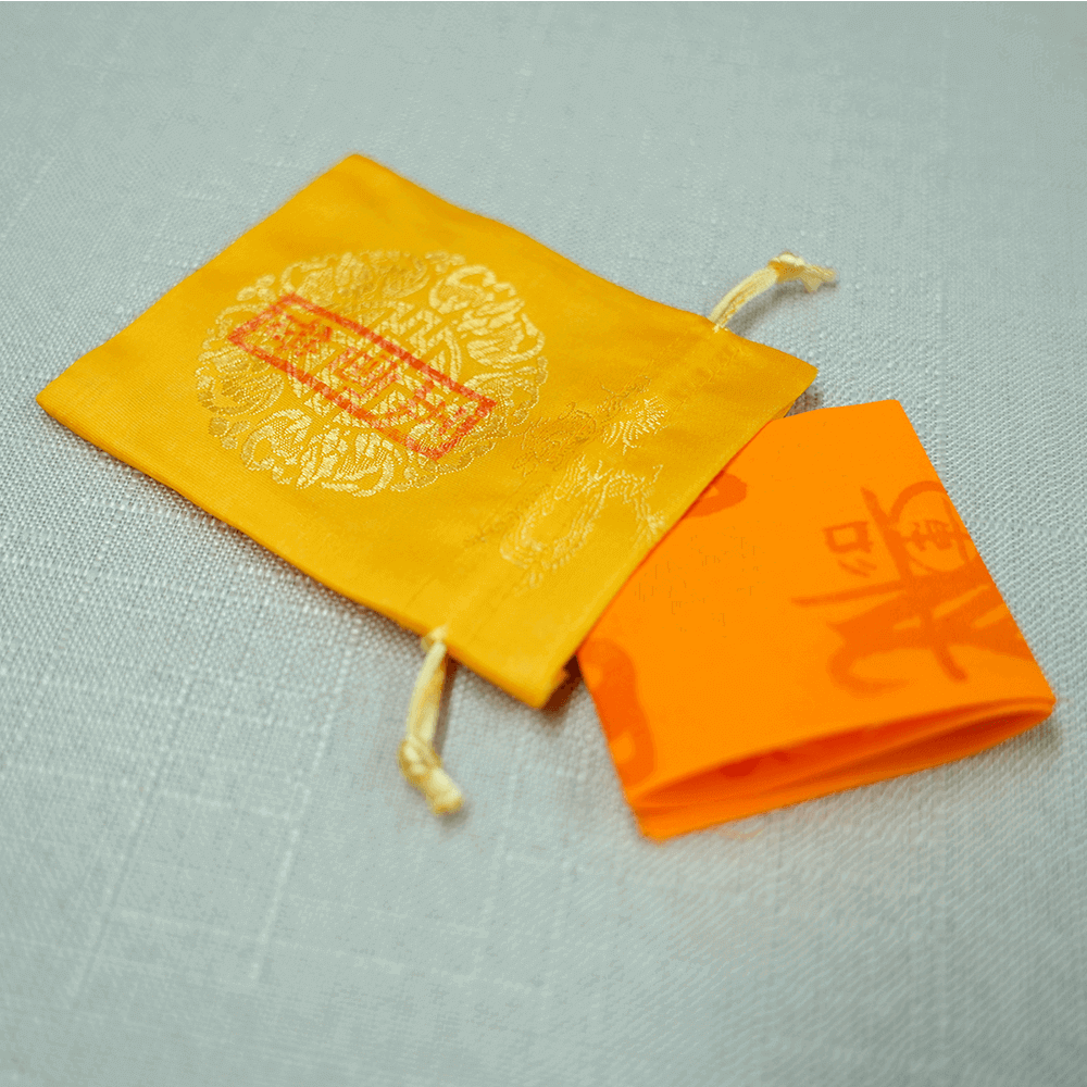 Stacked Five Thunder Talisman cloth and pouch, side profile display