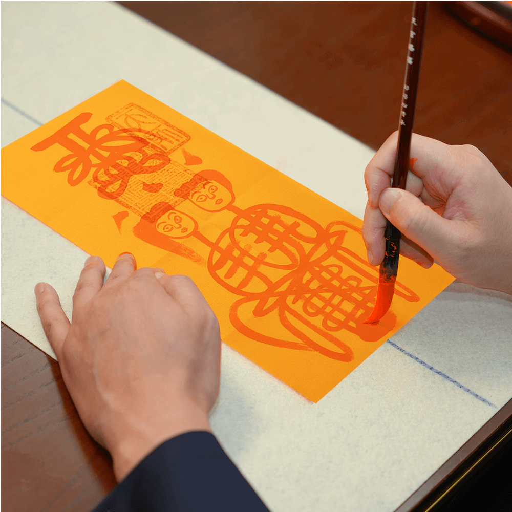 Master inscribing Marriage Harmony Talisman, infusing it with positive energy for strengthening marital bonds.