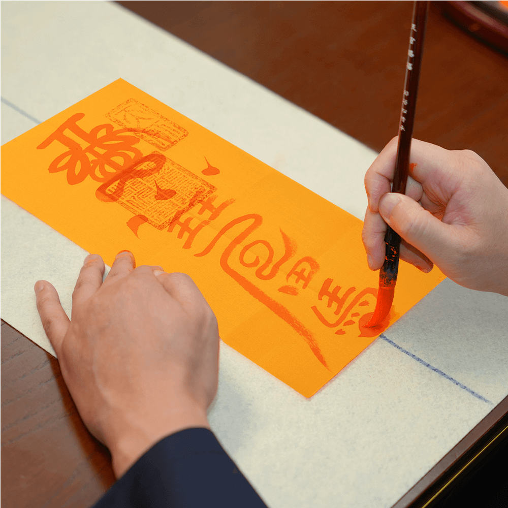Master creating protection talisman, ancient hand-calligraphy technique