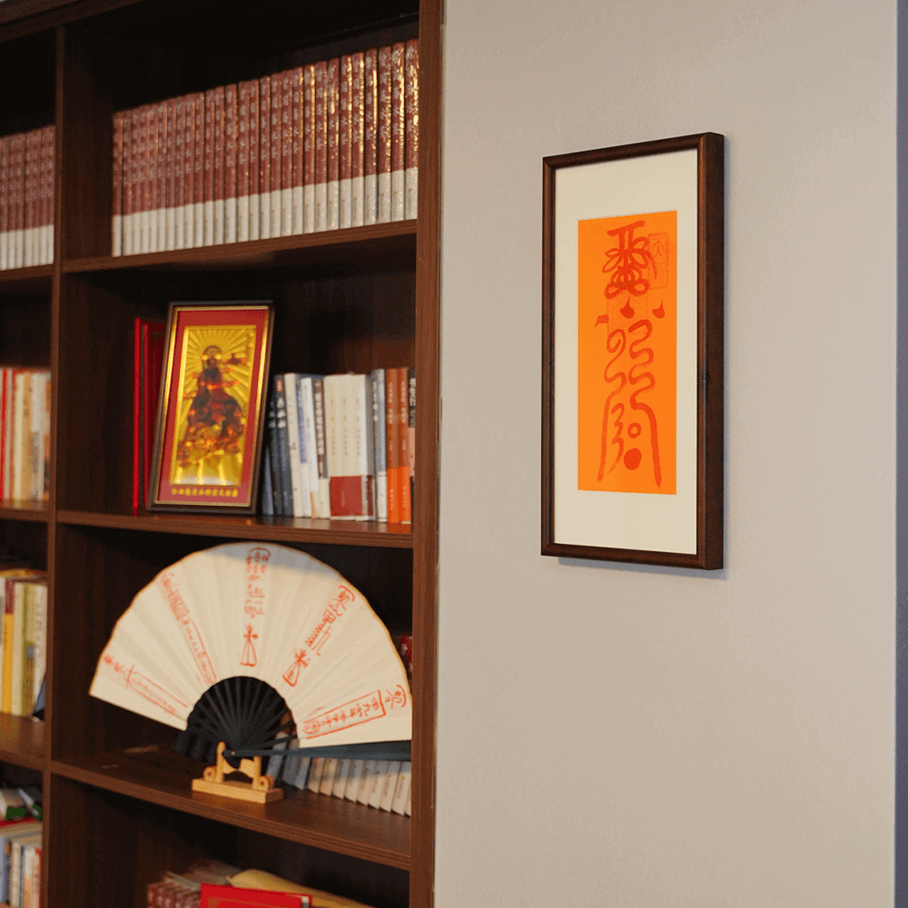 Luck Transformation Talisman displayed near prosperity symbols, enhancing luck accumulation on shelf.