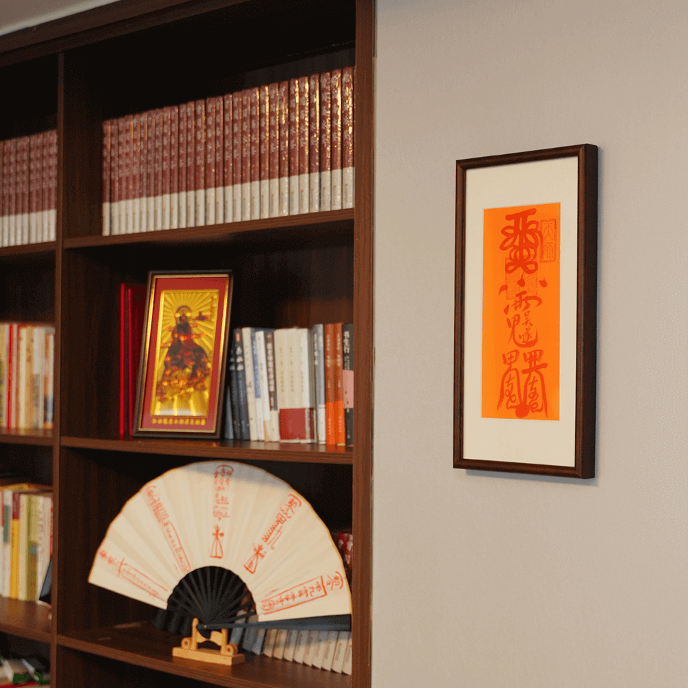 Taisui Talisman displayed near protective symbols, warding off negative influences on shelf.