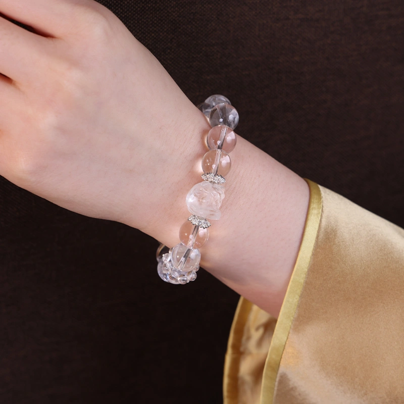 Close up of a Clear Quartz bracelet for better balance worn on the wrist.