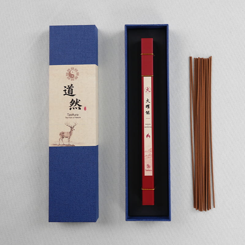 Unboxing TaoAura aromatic incense featuring the Five Elements Fire edition named Passion and Inspiration in a vibrant red inner sleeve.